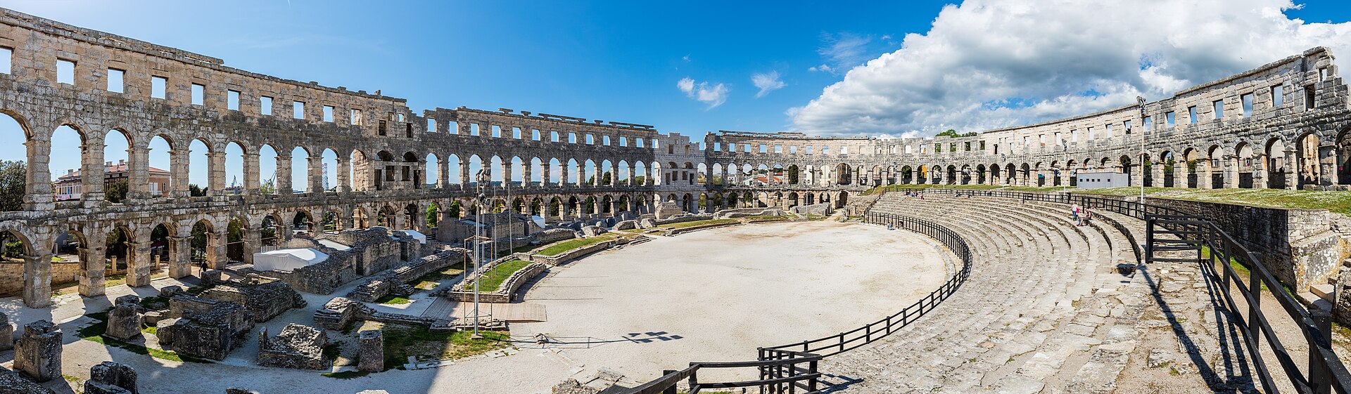 Panoramic view of the interior of the Pula Arena , an amphitheatre located in Pula , Croatia