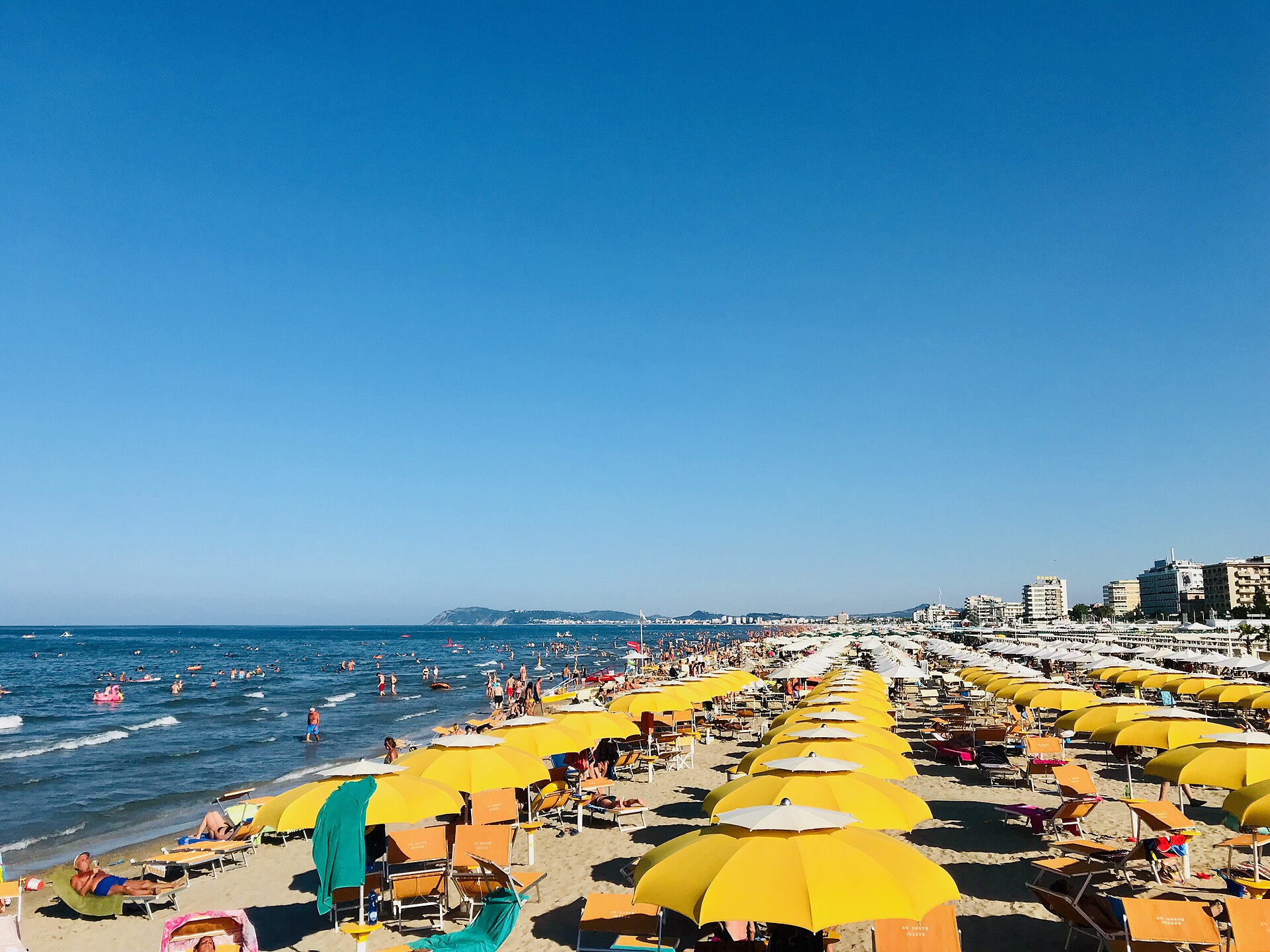 Riccione beach photographed from the canal port towards the south and the promontory of Monte San Bartolo