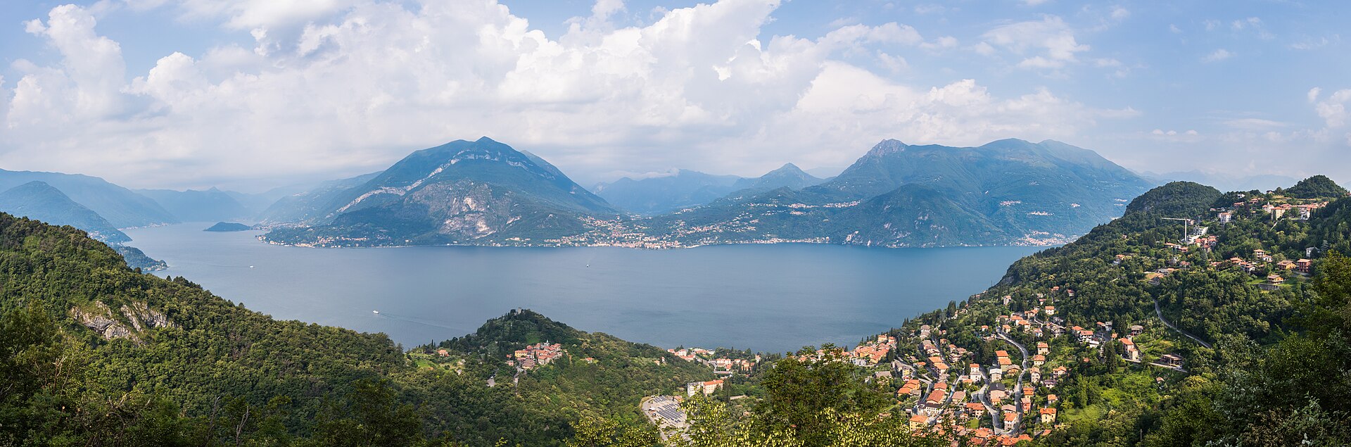 Panoramic view of Lake Como , a lake of glacial origin located in Lombardy , Italy . With 146 square kilometres (56 sq mi) it is the third largest in